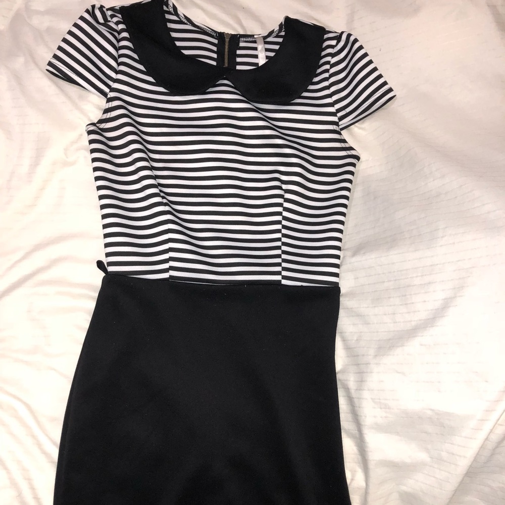 Black and white striped mini dress.